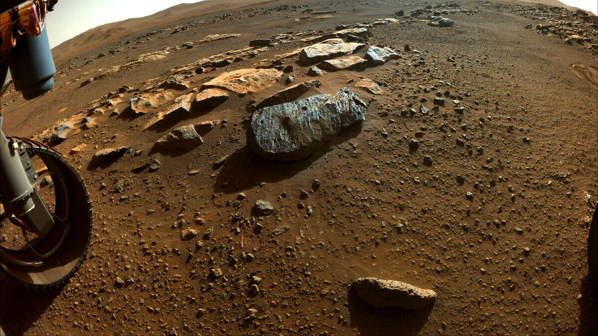The two holes where the Perseverance rover's drill obtained chalk-size samples from a rock nicknamed "Rochette" on Sept. 8, 2021. (NASA/JPL-Caltech)