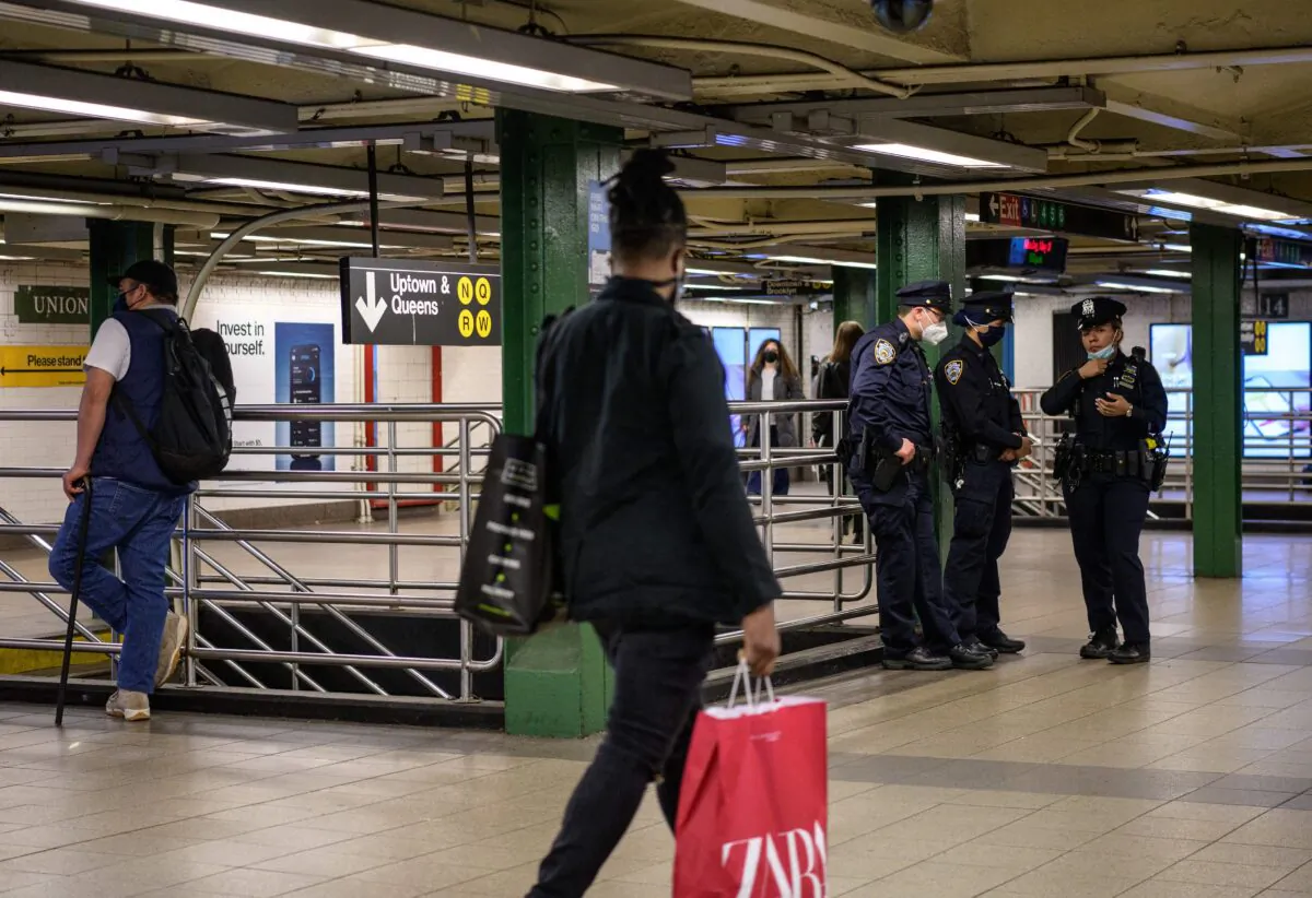 New York Police Officers stand at the Union Station subway stop in New York on May 10, 2021. (Angela Weiss/AFP via Getty Images)