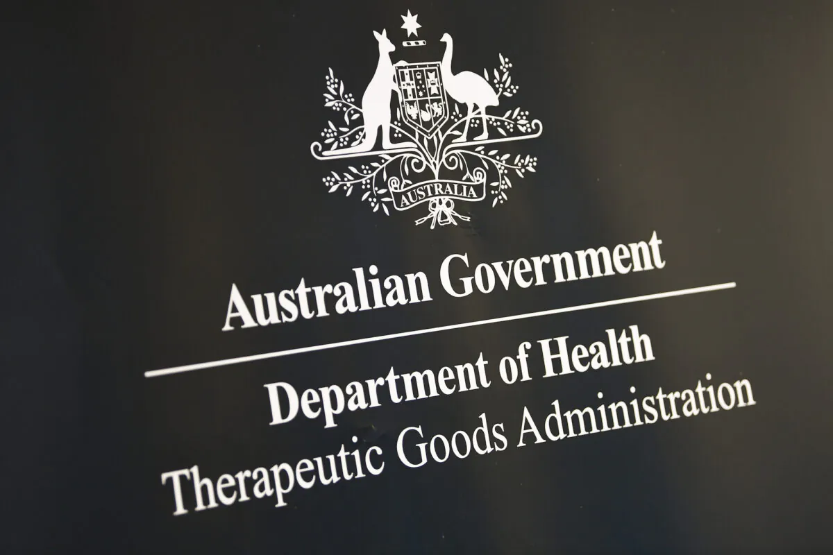 The logo of the Therapeutic Goods Administration is seen at a COVID-19 vaccines press conference in Canberra, Australia, on May 6, 2021. (AAP Image/Lukas Coch)