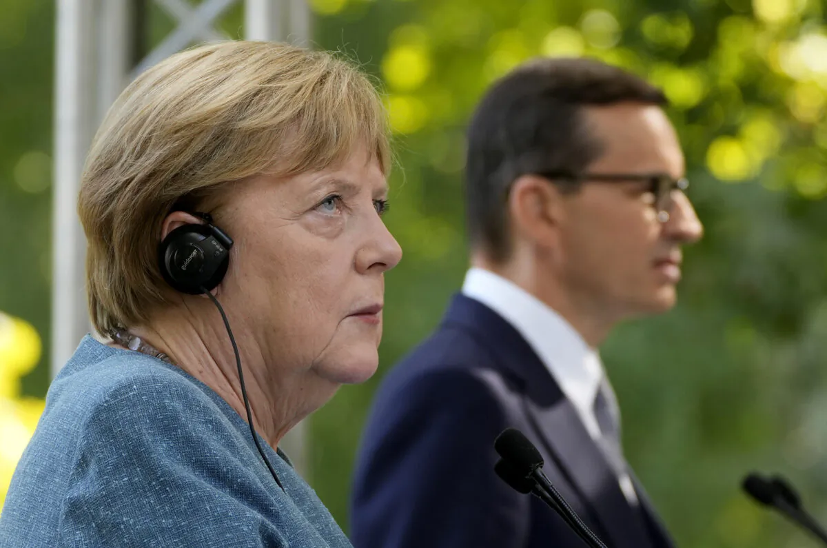 German Chancellor Angela Merkel and Poland's Prime Minister Mateusz Morawiecki give a press conference in Warsaw, on Sept.11, 2021. (Czarek Sokolowski /AP Photo)