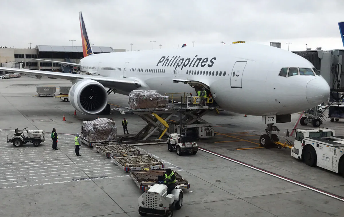 A Philippine Airlines Boeing 767 airplane sits at a gate at Los Angeles International Airport on May 24, 2018. (Daniel Slim/AFP via Getty Images)