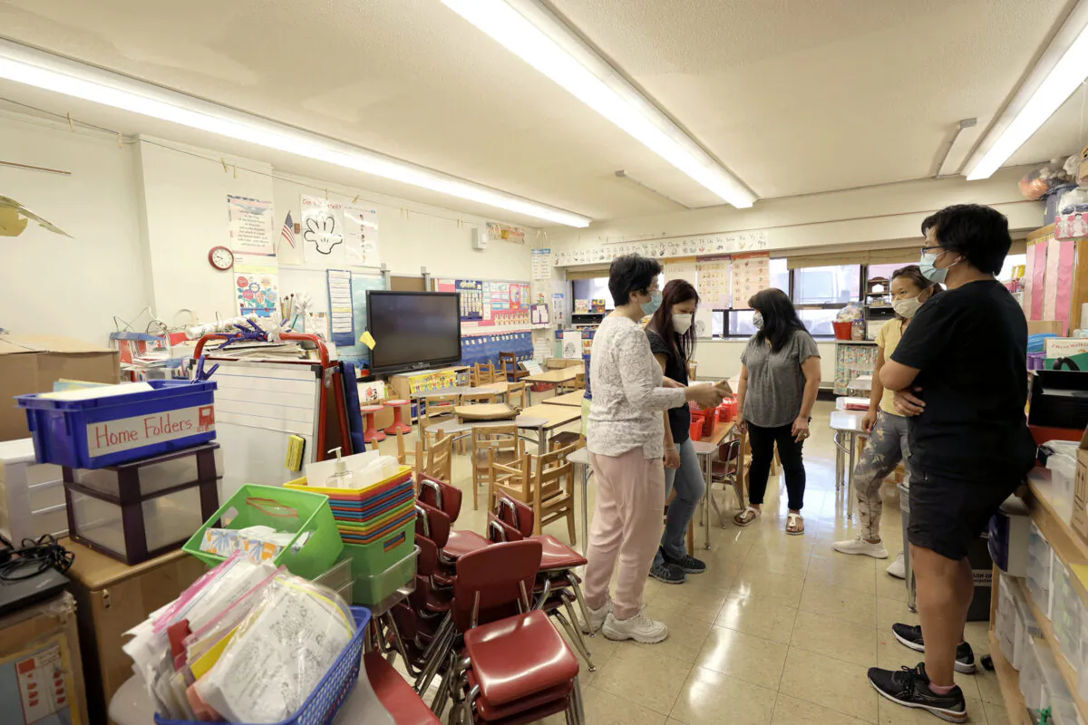 Teachers in Yung Wing School P.S. 124 in New York City, on Sept. 2, 2021. (Michael Loccisano/Getty Images)