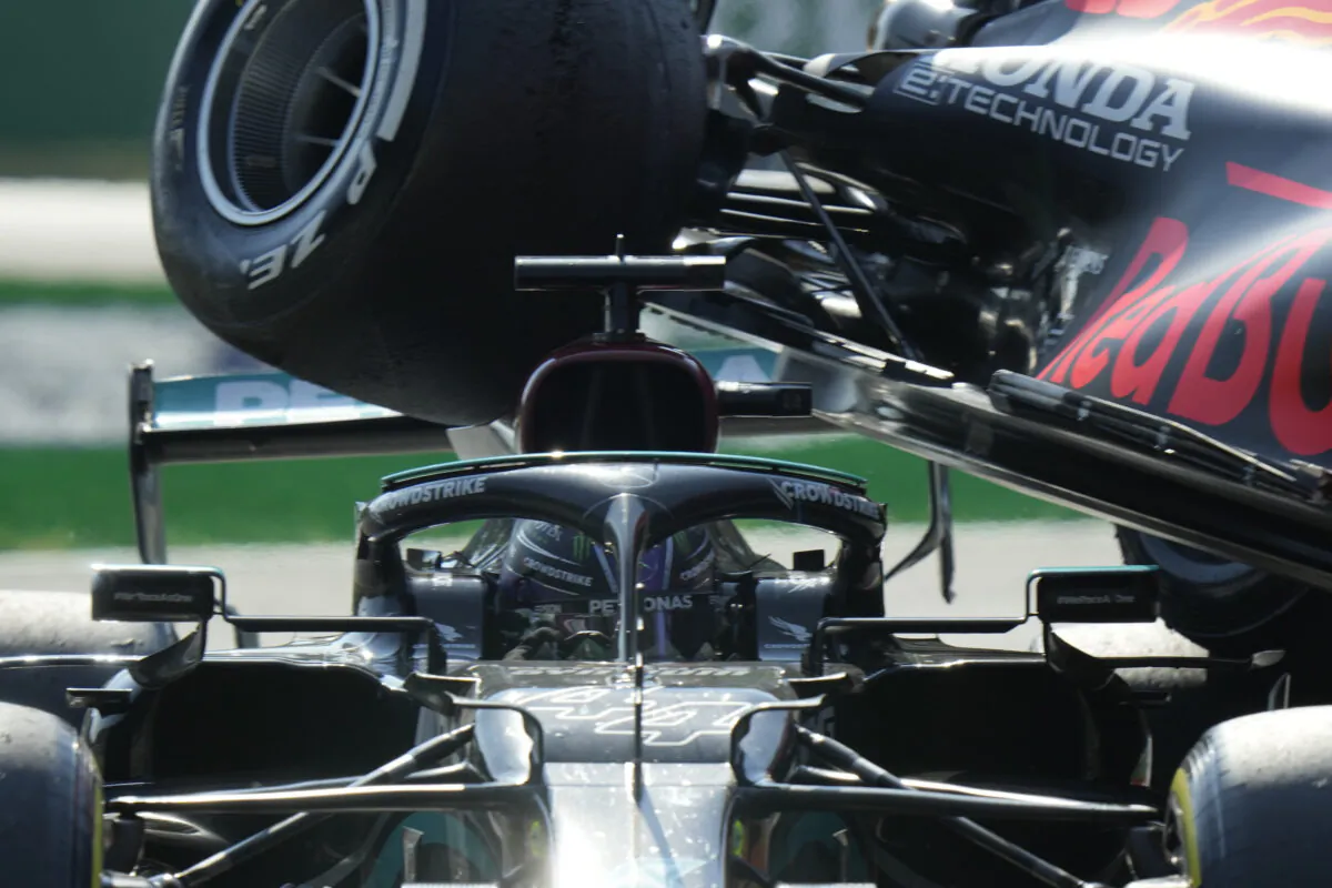 Mercedes driver Lewis Hamilton of Britain crashes with Red Bull driver Max Verstappen of the Netherlands during the Italian Formula One Grand Prix at Monza racetrack in Monza, Italy, on Sept. 12, 2021. (Luca Bruno/AP Photo)