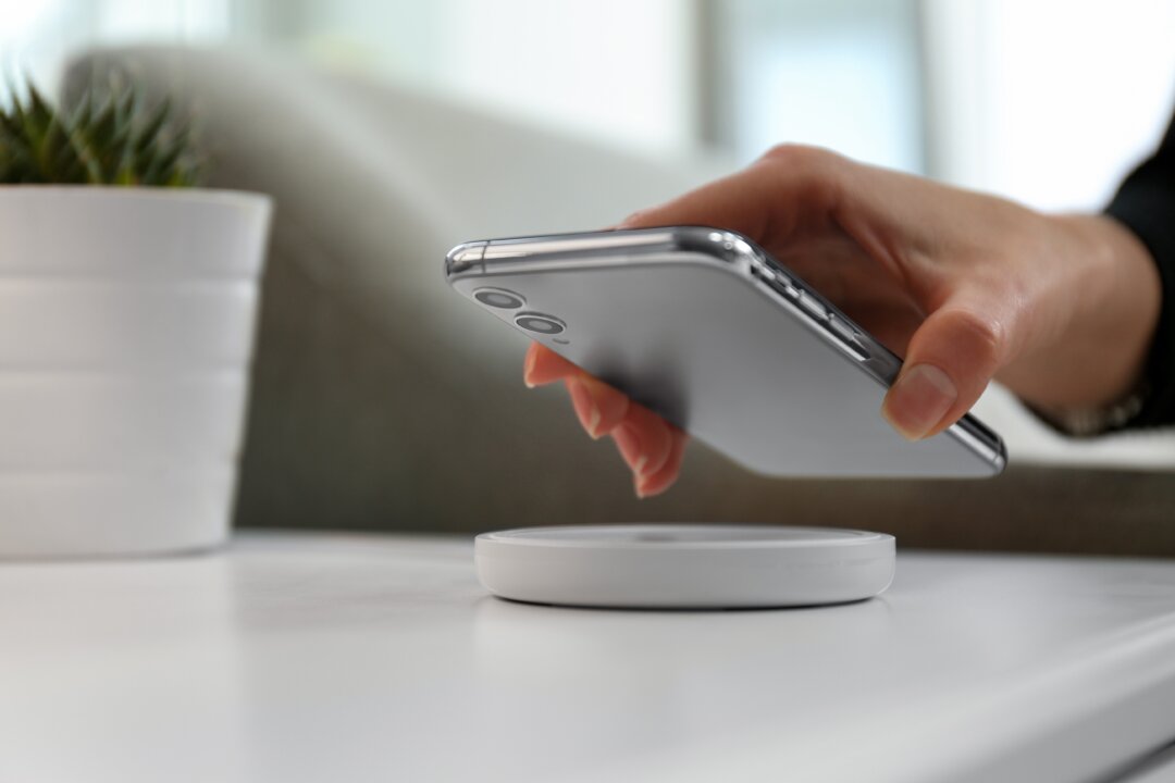 The wireless industry and its regulators have long maintained that wireless technology is without risk, but a recent ruling is forcing the FCC to address emerging and substantial evidence of harmful effects. (New Africa/Shutterstock)