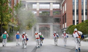 Chinese City With COVID-19 Outbreak Stops Buses, Trains