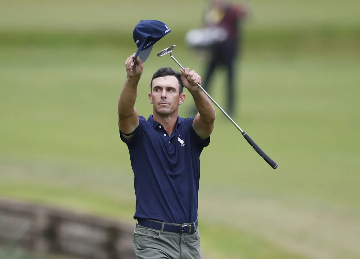 Billy Horschel of the United States reacts to the crowd during the final hole before winning the BMW PGA Championship Action at the Wentworth Golf Club in Virginia Water, Britain, on Sept.12, 2021. (Paul Childs/Reuters)