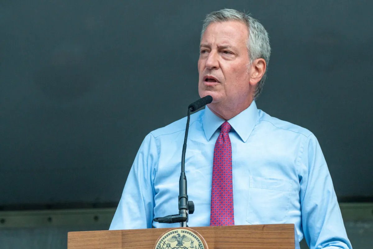 New York City Mayor Bill de Blasio presents a proclamation at the 46th Precincts National Night Out in the Bronx borough of New York City, on Aug. 3, 2021. (David Dee Delgado/Getty Images)