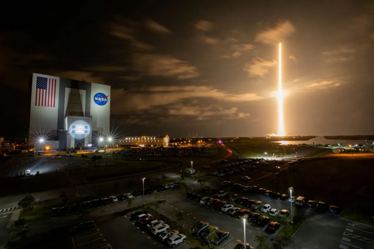 With a view of the iconic Vehicle Assembly Building at left, a SpaceX Falcon 9 rocket soars upward from Launch Complex 39A carrying the company’s Crew Dragon Endeavour capsule and four Crew-2 astronauts towards the International Space Station at NASA’s Kennedy Space Center in Cape Canaveral, Fla., on April 23, 2021. (Ben Smegelsky/Nasa via Reuters)
