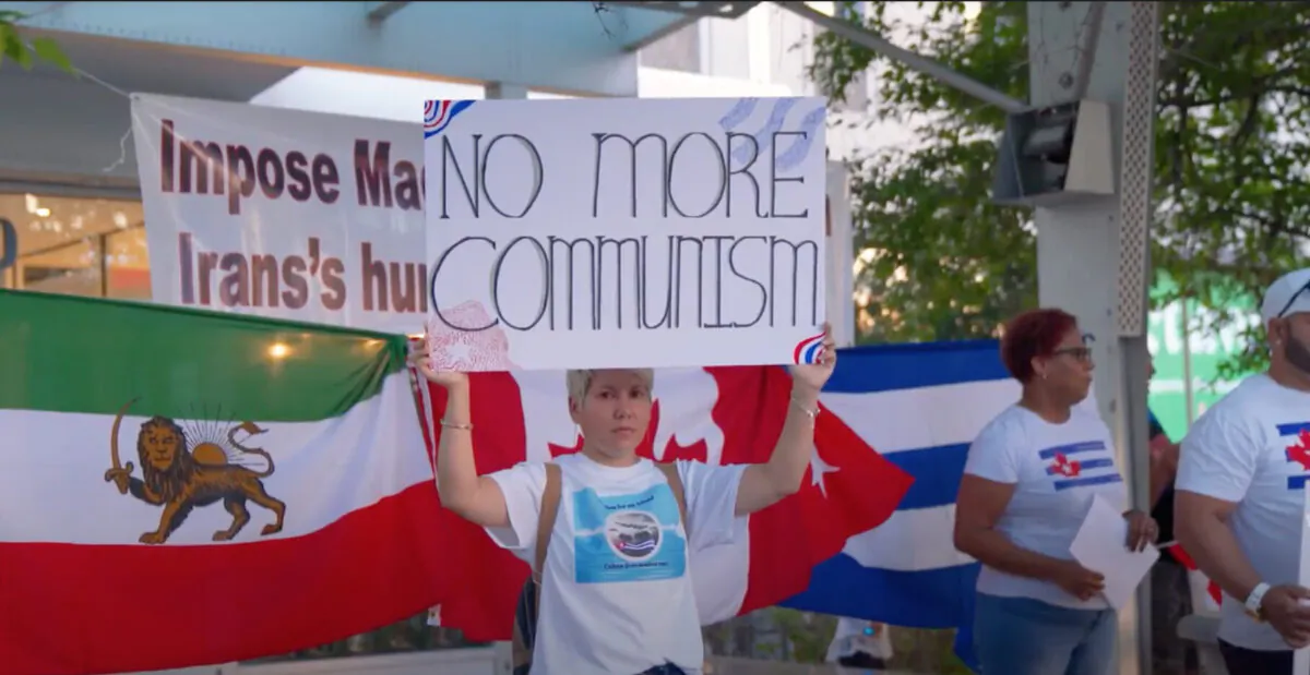 Iranian and Cuban communities rally outside the constituency office of Liberal Leader Justin Trudeau in Montreal on Sept. 11, 2021. (NTD Television)
