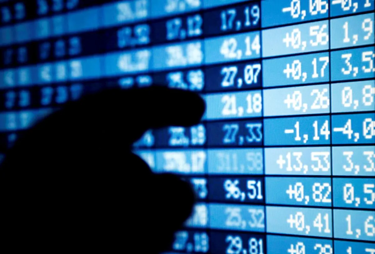 A man points a computer screen showing stock information in this illustration photo taken in Bordeaux, France, on March 30, 2016. (Regis Duvignau/Reuters)