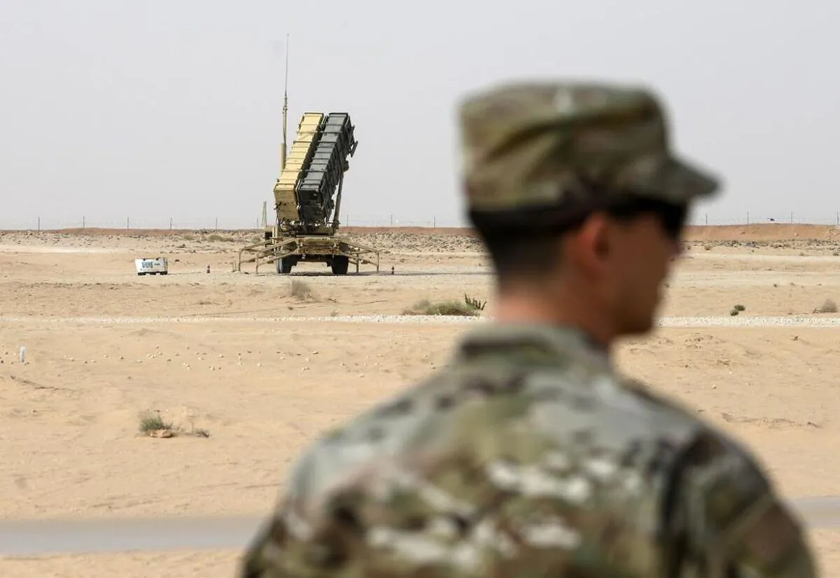 A member of the U.S. Air Force stands near a Patriot missile battery at Prince Sultan Air Base in Saudi Arabia, on Feb. 20, 2020. (Andrew Caballero-Reynolds/Pool via AP, File)