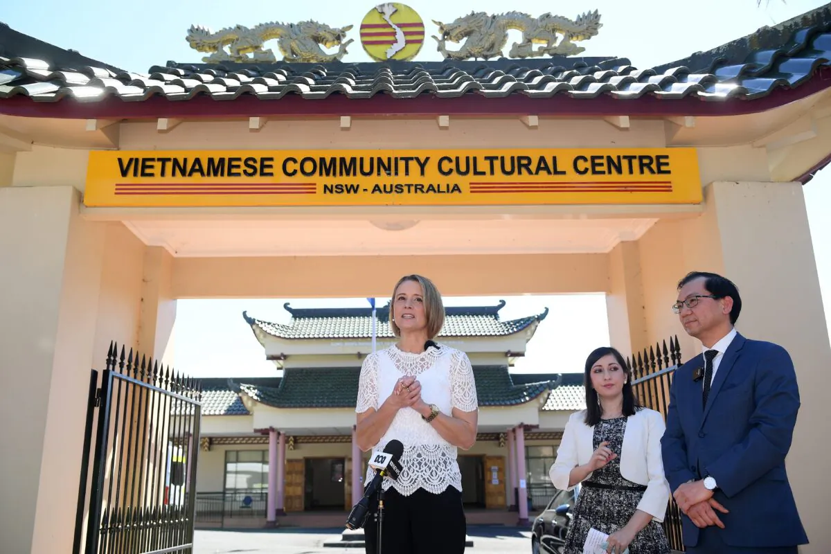 Labor Senator Kristina Keneally along with President of the Vietnamese Community in Australia Paul Nguyen, and Fairfield Councillor Sera Yilmaz (second right) during a press conference at The Vietnamese Community Cultural Centre in Sydney, Saturday, September 11, 2021. (AAP Image/Dan Himbrechts)
