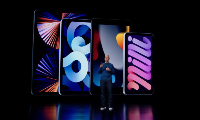 Apple CEO Tim Cook introduces the latest iPad and iPad mini to the iPad lineup during a special event at Apple Park in Cupertino, Calif., on Sept. 14, 2021. (Brooks Kraft/Apple Inc/Handout via Reuters)