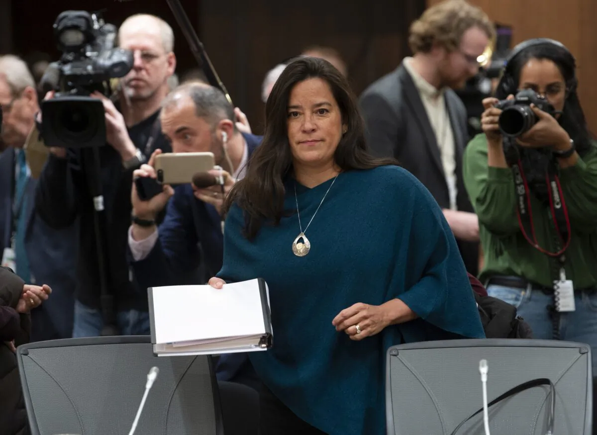 Cameras follow Jody Wilson-Raybould as she waits to testify before the House justice committee about allegations that the Prime Minister’s Office pressured her to intervene in a criminal prosecution against SNC-Lavalin during her tenure as attorney general, on Feb. 27, 2019. (The Canadian Press/Adrian Wyld)