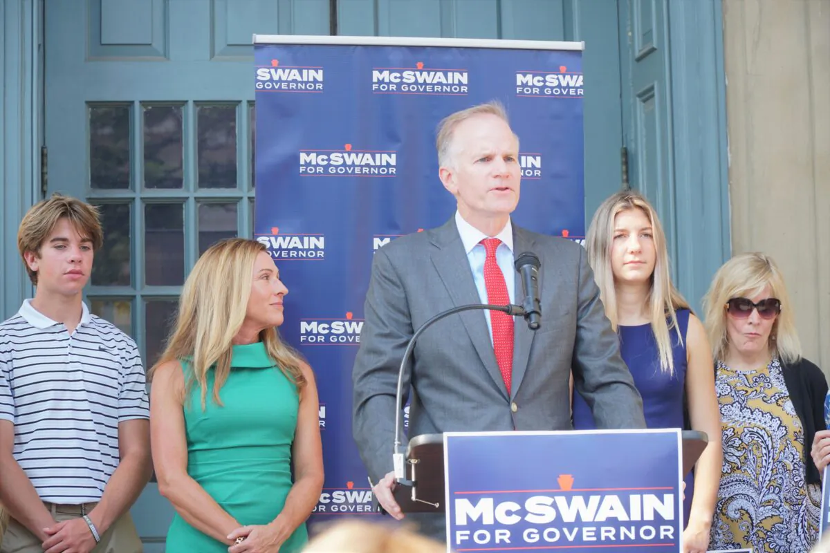 Former U.S. Attorney Bill McSwain made public his run for governor on Sept. 13, 2021, on West Chester Courthouse steps. His wife Stephanie (2nd left ) and four children joined him.  (Lily Sun/The Epoch Times) 
