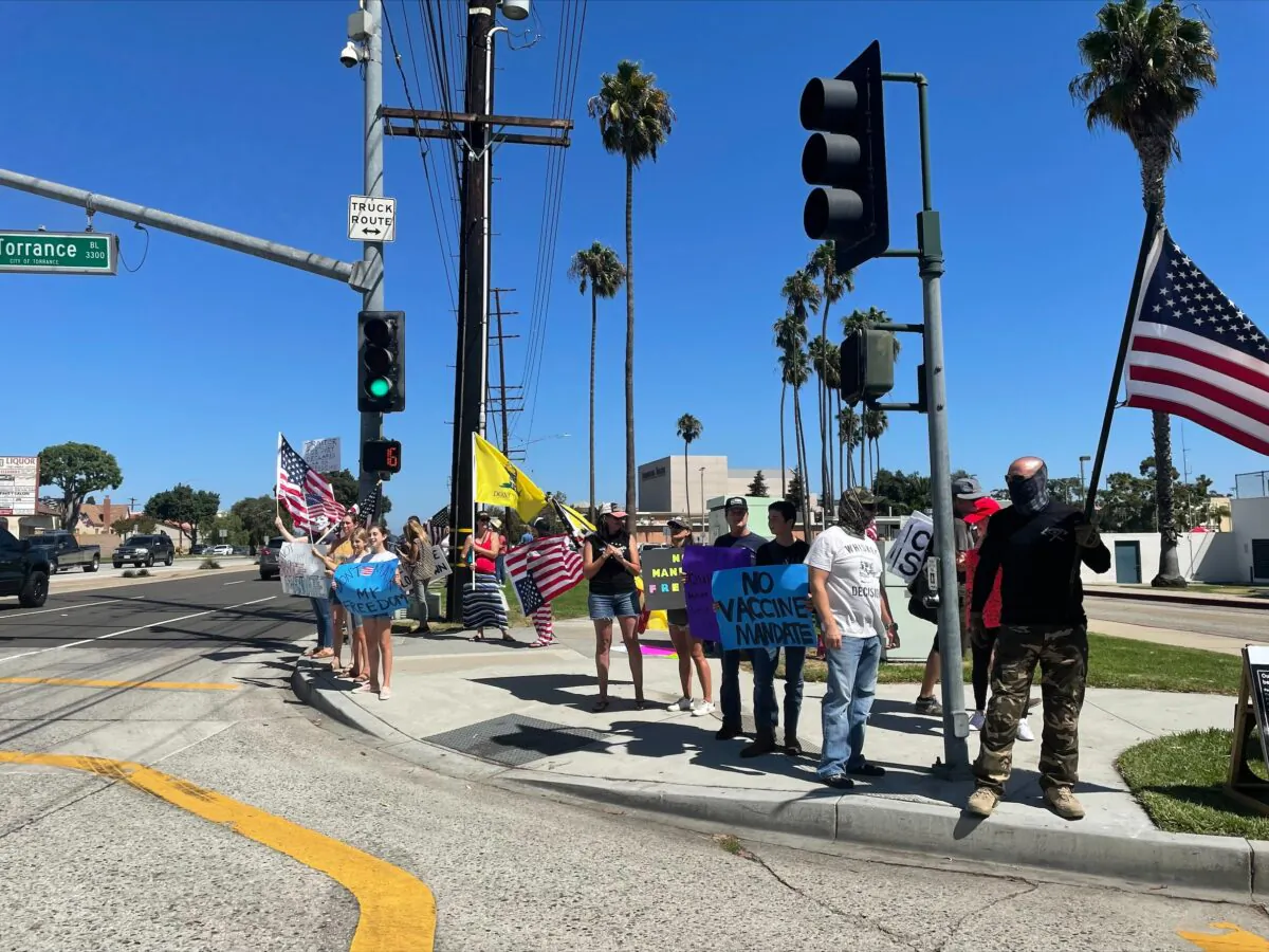 South Bay residents gather in front of City Hall to protest against mask and vaccine mandates in Torrance, Calif., on Sept. 11, 2021. (Alice Sun/The Epoch Times)
