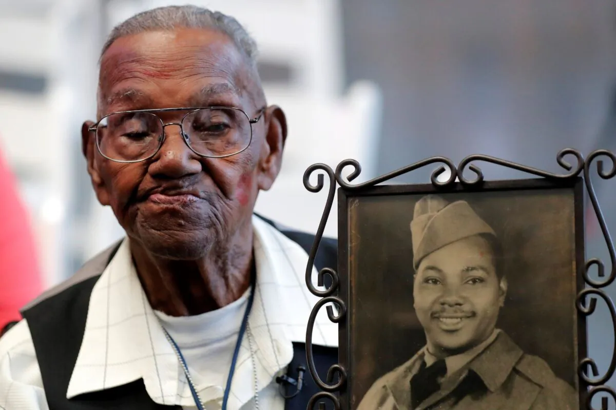 In this file photo, World War II veteran Lawrence Brooks celebrates his 110th birthday at the National World War II Museum in New Orleans, La., on Sept. 12, 2019. (Gerald Herbert/AP Photo)