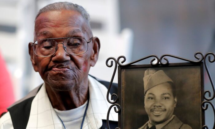 In this file photo, World War II veteran Lawrence Brooks celebrates his 110th birthday at the National World War II Museum in New Orleans, La., on Sept. 12, 2019. (Gerald Herbert/AP Photo)