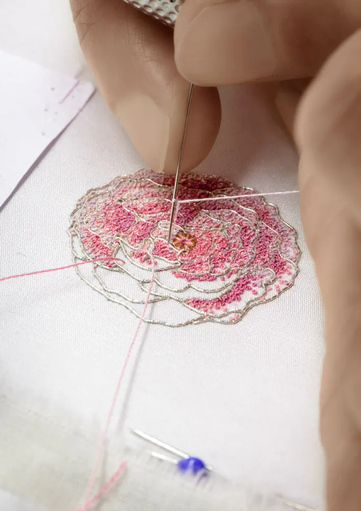 The gold thread used for this rose, for a Piaget watch face, was hair-thin and had to be handled with extreme care. (Piaget/Courtesy of Le Bégonia d'Or )