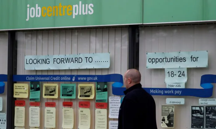 A man walks past a job centre in Manchester, Britain, on July 8, 2020. (Phil Noble/Reuters)