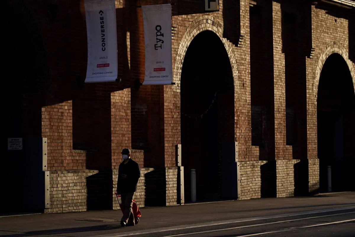 A man wearing a protective face mask walks past a usually busy market in the city centre during a lockdown to curb the spread of a coronavirus disease (COVID-19) outbreak in Sydney, Australia on Aug. 31, 2021. (Loren Elliott/Reuters)