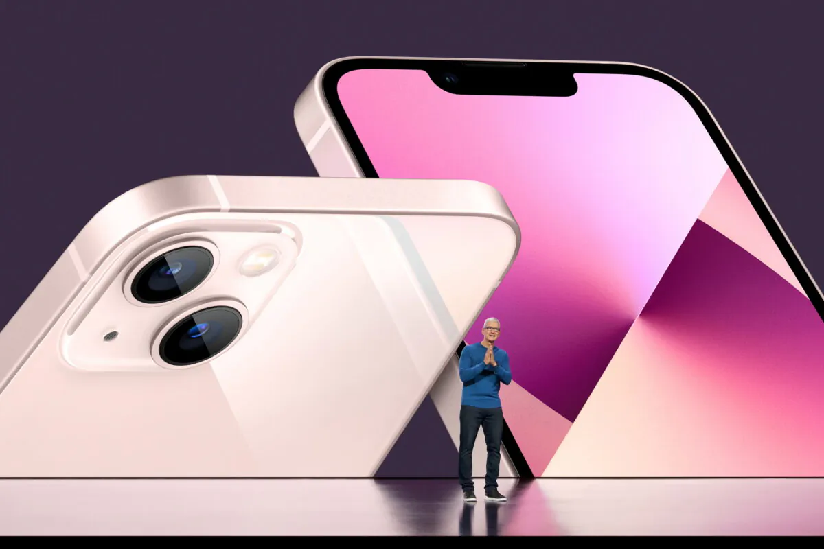 Apple CEO Tim Cook unveils the new iPhone 13 during a special event at Apple Park in Cupertino, Calif., on Sept. 14, 2021. (Brooks Kraft/Apple Inc/Handout via Reuters)