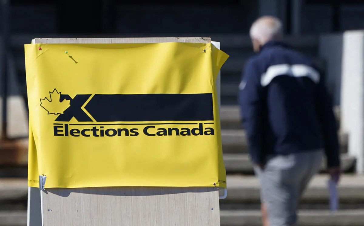 A man enters an advance polling station in Ottawa, Sept. 10, 2021, ahead of the federal election on Sept. 20th. (The Canadian Press/Adrian Wyld)