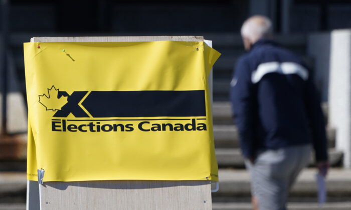 A man enters an advance polling station in Ottawa, Sept. 10, 2021. (The Canadian Press/Adrian Wyld)