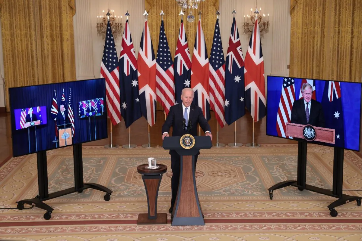 President Joe Biden speaks during an event with Australian Prime Minister Scott Morrison (L) and United Kingdom Prime Minister Boris Johnson (R) in the East Room of the White House on Sept. 15, 2021. (Win McNamee/Getty Images)