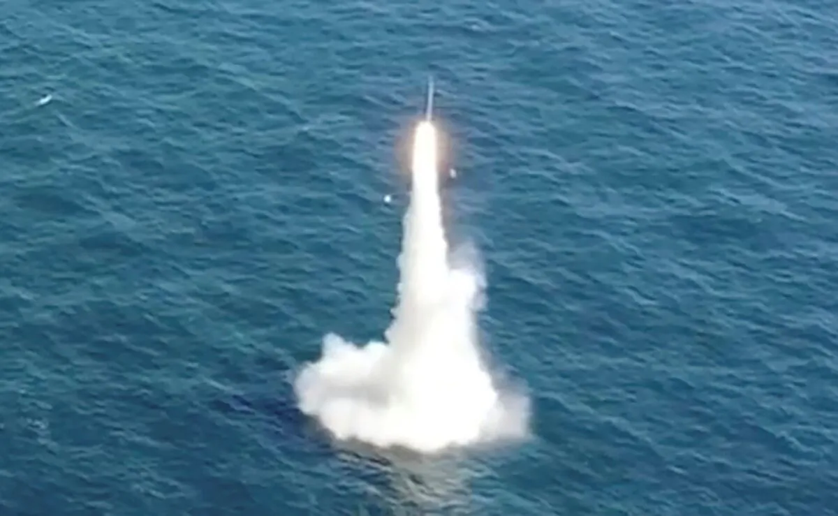 In this screenshot, South Korea's first underwater-launched ballistic missile is test-fired from a 3,000-ton-class submarine at an undisclosed location in the waters of South Korea, on Sept. 15, 2021. (South Korea Defense Ministry via AP)