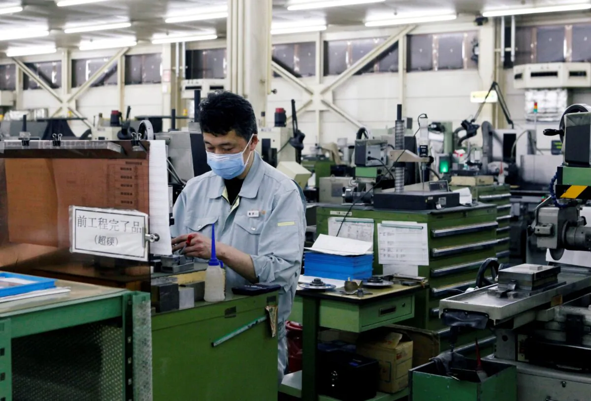 A worker is seen at the factory of Nagumo Seisakusho Co., Ltd. in Jyoetsu, Niigata prefecture, Japan
on Feb. 22, 2019. (Tetsushi Kajimoto/Reuters)