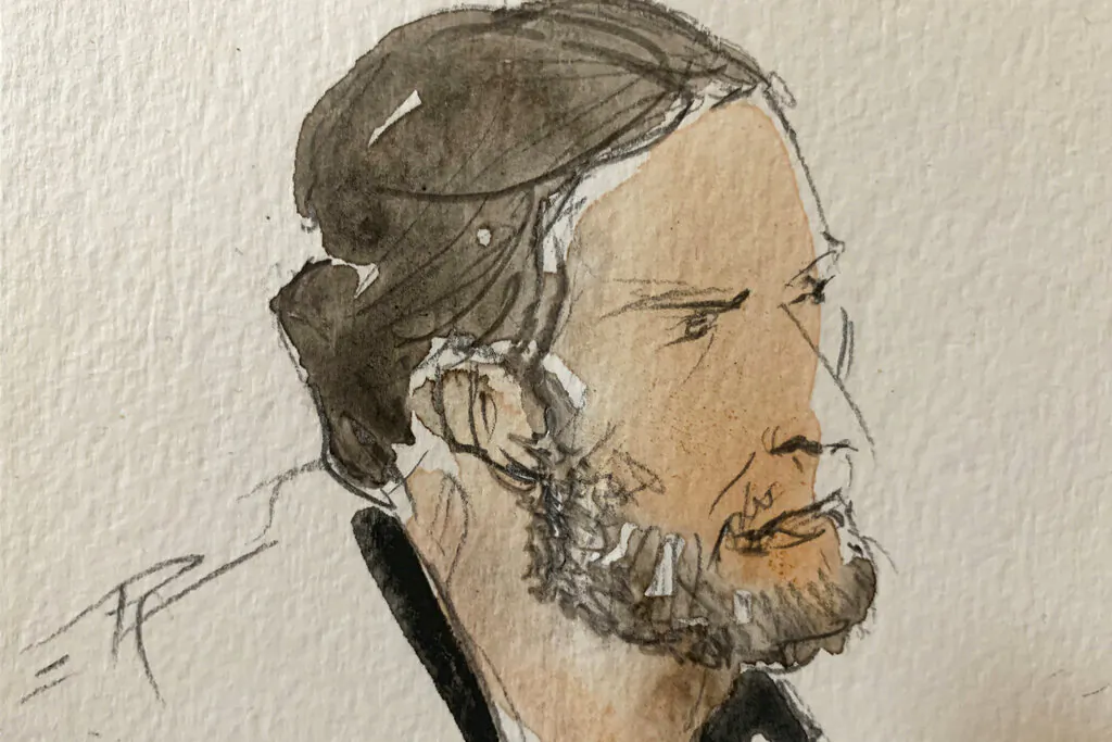 This Sept. 8, 2021 courtroom sketch shows key defendant Salah Abdeslam, in the special courtroom built for the 2015 attacks trial, in Paris. (Noelle Herrenschmidt via AP)