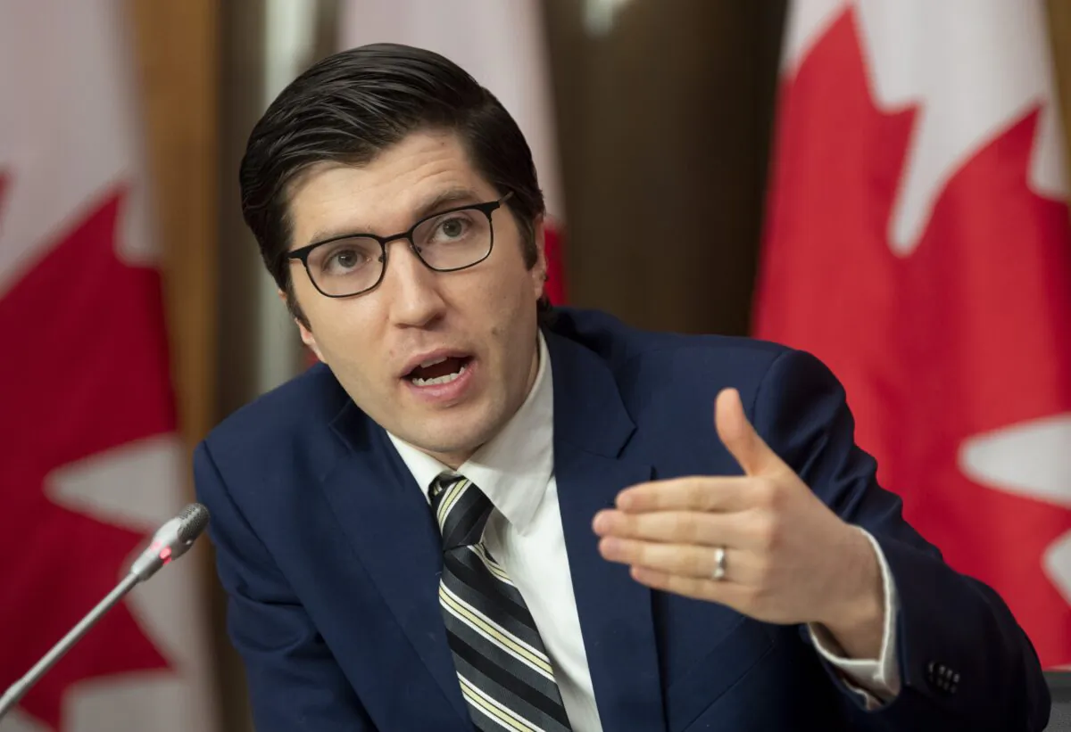 Conservative MP Garnett Genuis responds to a question during a news conference in Ottawa on Nov. 26, 2020. (The Canadian Press/Adrian Wyld)