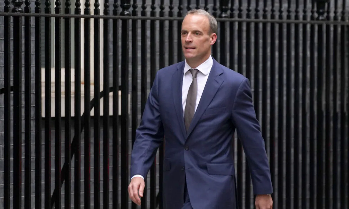 Then-Foreign Secretary Dominic Raab arrives at Downing Street as Prime Minister Boris Johnson carries out a Cabinet reshuffle in London on Sept. 15, 2021. (Stefan Rousseau/PA)