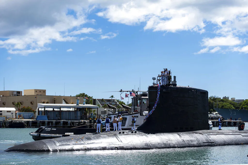 The Virginia-class nuclear-powered attack submarine USS Illinois (SSN 786) returns home to Joint Base Pearl Harbor-Hickam from a deployment in the 7th Fleet area of responsibility on Sept. 13, 2021. (Mass Communication Specialist 1st Class Michael B. Zingaro/U.S. Navy via AP)