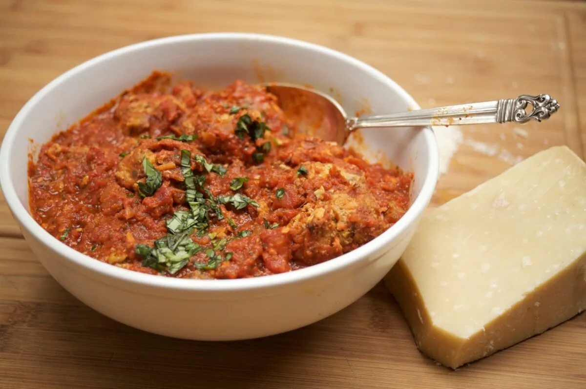 Serve these meatballs alone, with your favorite pasta, or on a baguette with the tomato sauce spooned over them. (Gabe Sachs/TNS)