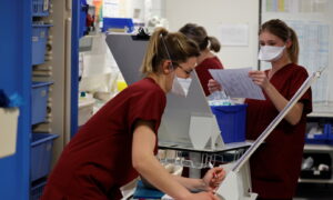 Thousands of Health Employees Laid Off in France Over Vaccine Mandate