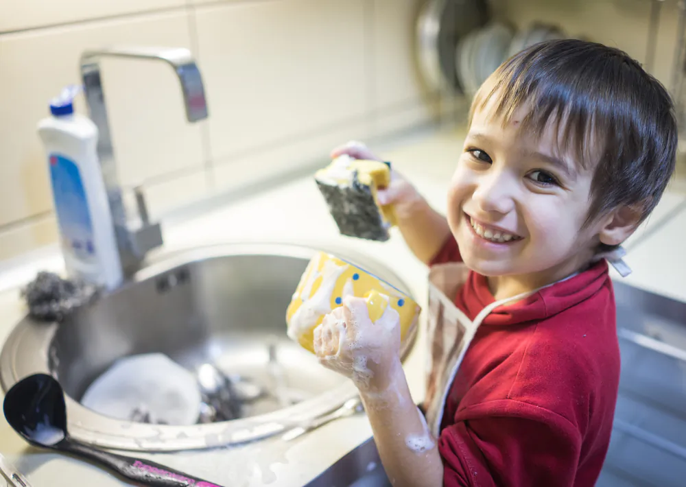 Teaching children to work gives them dignity in a job well done today and the tools and character to win as adults in the future. (Zurijeta/Shutterstock)