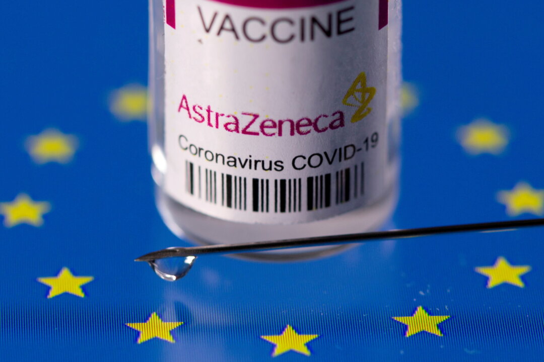 A vial of AstraZeneca's COVID-19 vaccine placed on displayed EU flag is seen in this illustration picture taken on March 24, 2021. (Dado Ruvic/Illustration/Reuters)