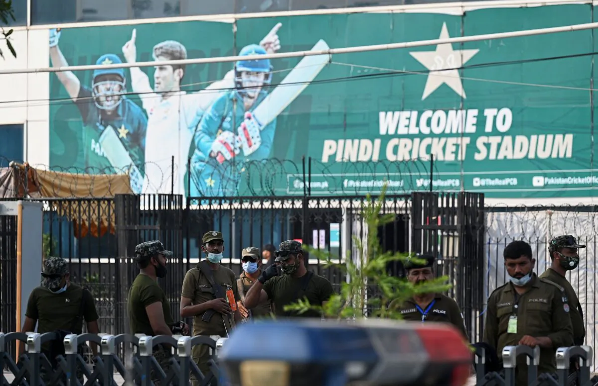 Policemen stand guard outside the Rawalpindi Cricket Stadium in Rawalpindi, Pakistan, on Sept. 17, 2021. (Aamir Qureshi/AFP via Getty Images)