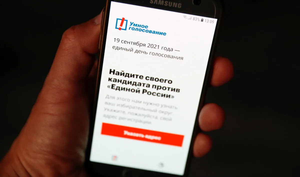 The Russian opposition politician Alexei Navalny's Smart Voting app is seen on a phone, in Moscow, Russia, on Sept. 16, 2021. (Shamil Zhumatov/Reuters)