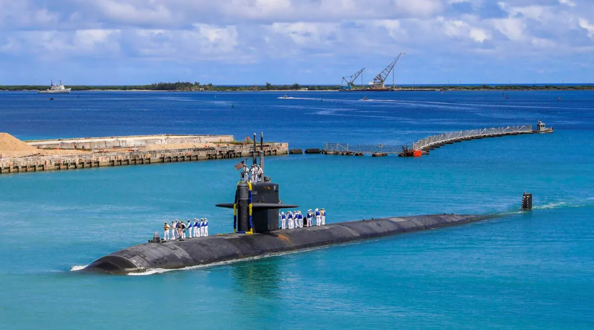 The Los Angeles-class fast attack submarine USS Oklahoma City (SSN 723) returns to U.S. Naval Base in Guam on Aug. 19, 2021. (Mass Communication Specialist 3rd Class Naomi Johnson/U.S. Navy via AP)