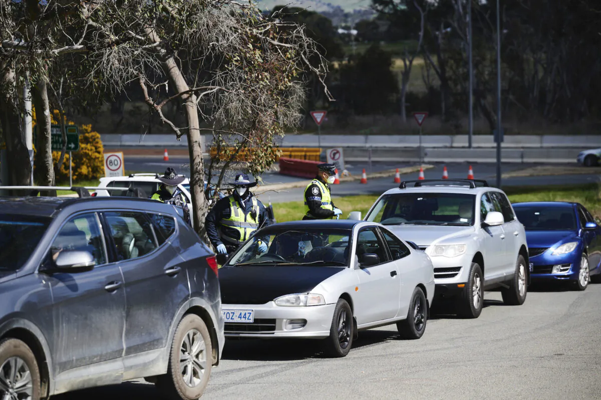 ACT Police perform checks on traffic on the NSW/ACT Border in Australia, on Sept. 14, 2021. (Rohan Thomson/Getty Images)