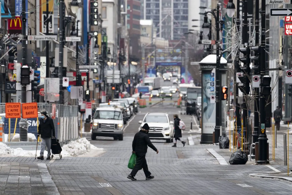A quiet Saint-Catherine Street in Montreal under Quebec's new COVID-19 lockdown measures, including a curfew, on Jan. 11, 2021. (The Canadian Press/Paul Chiasson)
