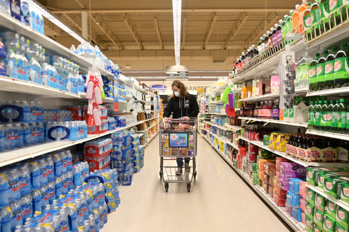 Professional shopper shops for a customer at Acme Market in Clark, New Jersey, on April 27, 2020. (Michael Loccisano/Getty Images)