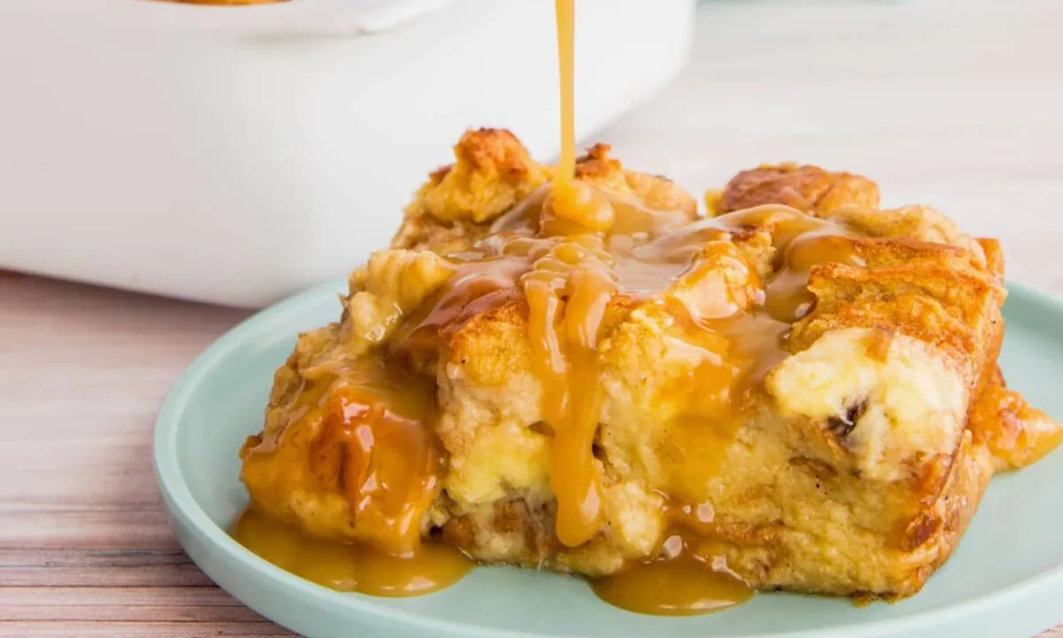 This banana custard-based bread pudding is exceptional on its own, but a warm rum toffee sauce makes it even more decadent. (Marta Rivera Diaz/TNS)