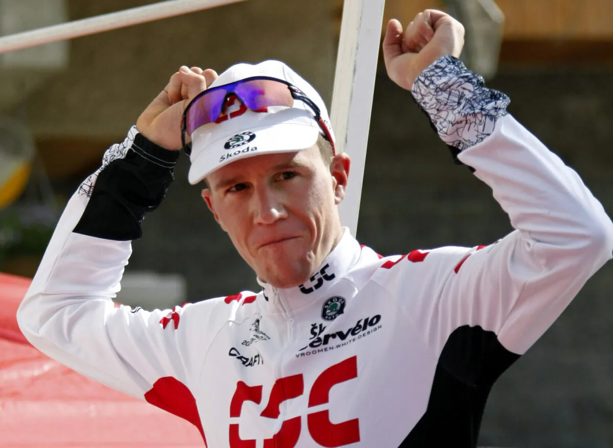 Chris Anker Sorensen of Denmark celebrates on the podium after winning the sixth stage of the Dauphine cycling race between Morzine and La Toussuire, in La Toussuire, French Alps, on June 14, 2008. (Robert Pratta/Reuters)