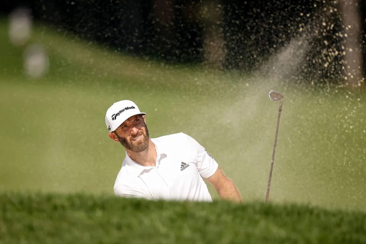 Dustin Johnson plays his shot in a championship golf tournament in Owings Mills, Md., on Aug. 26, 2021. (Scott Taetsch/USA TODAY Sports via Reuters)