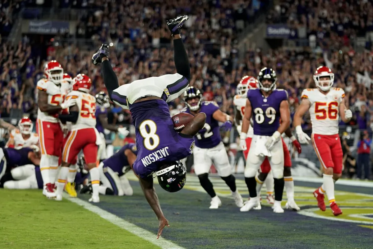 Baltimore Ravens quarterback Lamar Jackson scores a touchdown in the second half of an NFL football game against the Kansas City Chiefs, in Baltimore, Md., on Sept. 19, 2021. (Julio Cortez/AP Photo)