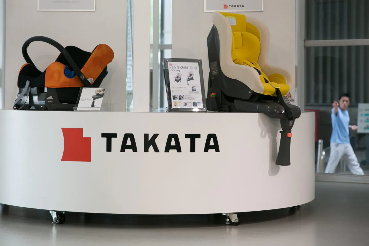 A Takata Corp. logo is seen on a display of child safety seats at a car showroom in Tokyo, Japan, on June 26, 2017. (Christopher Jue/Getty Images)